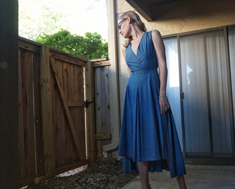 a woman in a denim dress 